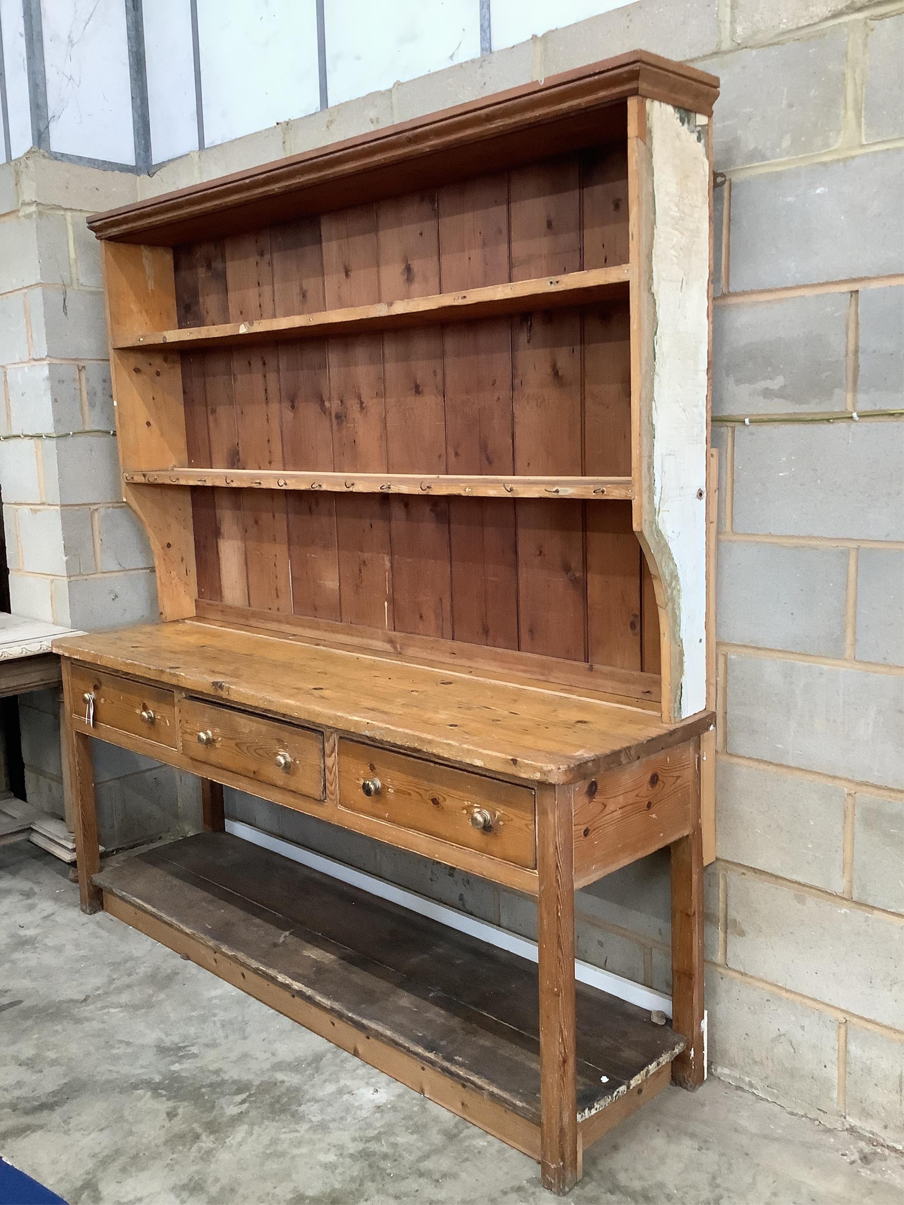 A Victorian pine Welsh dresser with boarded rack and three drawers, width 190cm, depth 49cm, height 202cm. Condition - fair